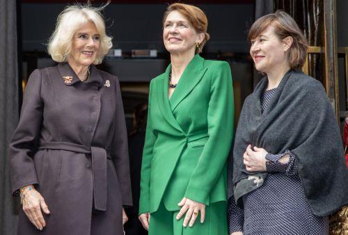 epa10550644 Britain's Camilla, the Queen Consort (L) and German First Lady Elke Buedenbender (C) are welcomed by Opera's artistic co-director Susanne Moser (R) as they visit the Komische Oper in Berlin, Germany, 30 March 2023. Britain's King and Queen consort are on a state visit to Germany, taking place from 29 to 31 March.  EPA/ANDREAS GORA / POOL