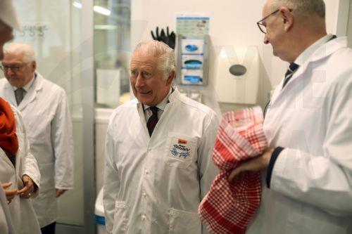 epa10550745 Britain's King Charles III (C) during a visit to Brodowin eco-village in Chorin, Germany, 30 March 2023. King Charles is on a three-day visit to Germany, his first state visit abroad as a monarch.  EPA/RAINER KEUENHOF / POOL