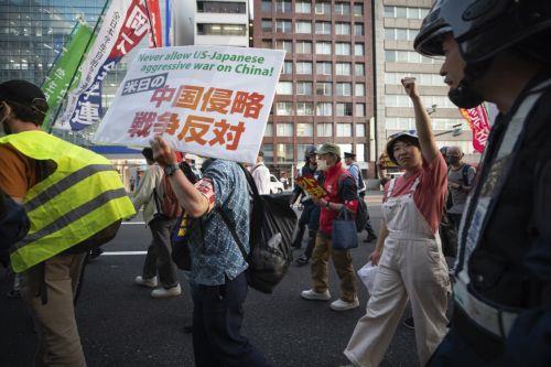 epa10633720 Activists protest against the G7 Hiroshima Summit in Hiroshima, Japan, 17 May 2023. The G7 Hiroshima Summit will be held from 19 to 21 May 2023.  EPA/HOW HWEE YOUNG