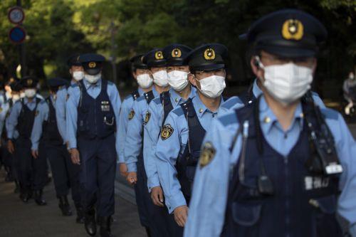epa10633817 Police officers patrol ahead of the G7 Hiroshima Summit at the Hiroshima Peace Memorial Park in Hiroshima, Japan, 17 May 2023. The G7 Hiroshima Summit will be held from 19 to 21 May 2023.  EPA/HOW HWEE YOUNG