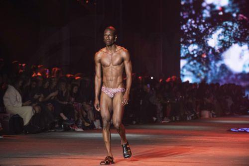 epa10634093 A models walks the runway at the David Jones Indigenous fashion show during Australian Fashion Week 2023 at Carriageworks in Sydney, New South Wales, Australia, 17 May 2023.  EPA/FLAVIO BRANCALEONE AUSTRALIA AND NEW ZEALAND OUT