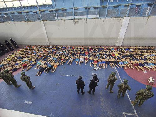 epa10820131 A handout photo made available by the Ecuadorian Armed Forces shows troops carrying out an operation at the Men's Social Rehabilitation Center No. 1, also known as the Litoral Penitentiary, in Guayaquil, Ecuador, 25 August 2023. Around 1,700 members of the Ecuadorian Police and Armed Forces carried out on 25 August an intervention in the Litoral...