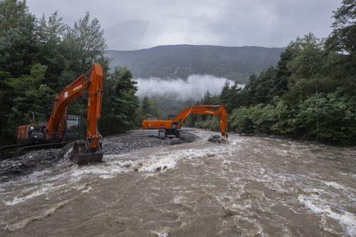 epa10825219 The Legiuna creek carries a lot of water, flooding and damaging the sourounding area, after heavy rainfalls in southern Switzerland in Malvaglia, Switzerland, 28 August 2023. The canton Tessin, Switzerland, has been flooded with rain since Friday night 25 August. According to forecasts, the rains will continue until 28 August.  EPA/Pablo...