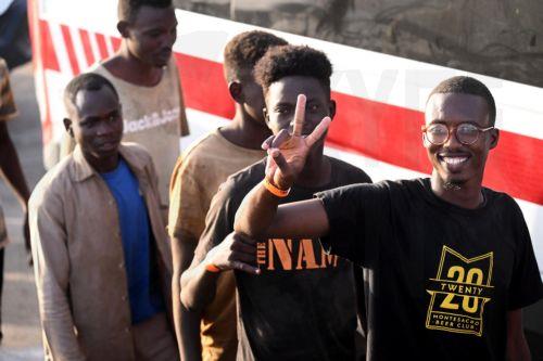 epa10867467 Migrants arrive at 'Molo Favarolo' in Lampedusa, southern Italy, 18 September 2023. Migrants traveling on a small boat were rescued by the Coast Guard. The group, after the health triage, will be transferred to the hotspot where, at the moment, there are 1,104 people.  Italian Deputy Premier and Foreign Minister Antonio Tajani on 15 September...
