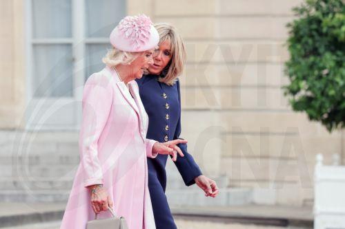 epa10871750 Britain's Queen Camilla (L) and French First Lady Brigitte Macron (R) walk together at the Elysee Palace in Paris, France, 20 September 2023. The visit, initially planned for March and postponed because of unrests in France, leads the king and queen of Great Britain to Paris and Bordeaux and includes a state dinner, official appointments with...