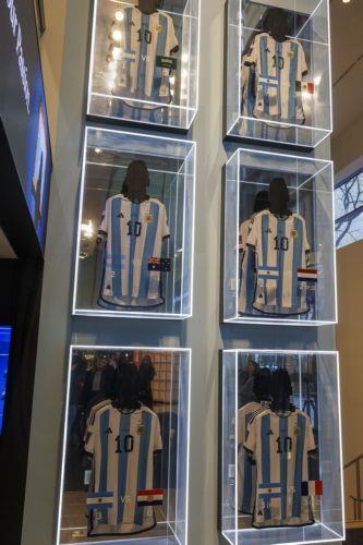 epaselect epa11003464 Six match-worn shirts of Argentine soccer player Lionel Messi from the 2022 FIFA World Cup are on display before auction at Sotheby's in New York, New York, USA, 30 November 2023. The set will be offered in a dedicated sale open for bidding from 30 November to 14 December.  EPA/SARAH YENESEL