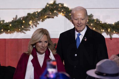 epa11004840 US President Joe Biden (R) and First Lady Jill Biden (L) attend the lighting of the National Christmas Tree on the Ellipse near the White House, in Washington, DC, USA, 30 November 2023. The lighting of the tree is an annual tradition attended by the US President and the First Family. President Calvin Coolidge lit the first National Christmas...