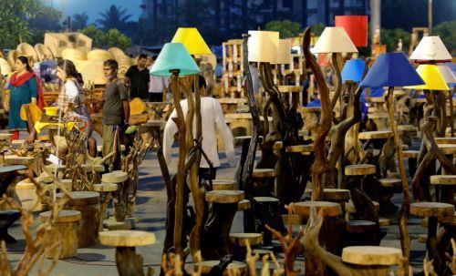 epa11010428 Indian artists display their crafted goods and products during the annual Craft Fair in Kolkata, eastern India, 04 December 2023. People from more than 15 states of India will take part in this one month long craft fair.  EPA/PIYAL ADHIKARY