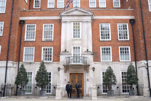 epa11107951 Police guard the London Clinic private hospital in London, Britain, 27 January 2024. Britain's King Charles III was scheduled for treatment for an enlarged prostate, after being admitted to the hospital on the morning of 26 January. Queen Camilla said the King was 'doing well' and was expected to spend at least one night at the hospital. ...
