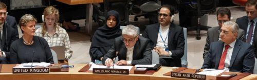 epa11279557 Islamic Republic of Iran Ambassador Amir Saeid Iravani (C) reads a speech to members of the Security Council at United Nations Headquarters in New York, New York, USA, 14 April 2024. The meeting was called to discuss the situation in the Middle East amid escalations between the State of Israel and the Islamic Republic of Iran.  EPA/STEPHANI...