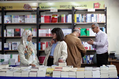 epa11289397 People visit the 38th Tunis International Book Fair, in Tunis, Tunisia, 19 April 2024. The book fair's 38th edition runs in Tunis from 19 to 28 April 2024, with the participation of 319 exhibitors from 25 different countries, including 161 Tunisians and 158 foreigners and Arabs. Egypt tops the list with 94 exhibitors participating in the event. ...