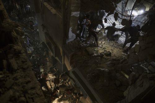 epa11289602 Palestinians search for victims of the Radwan family under the rubble after an Israeli air strike struck their home in the Rafah refugee camp, southern Gaza Strip, 19 April 2024. According to the Kuwait Hospital, eight people were killed in the air strike. More than 33,900 Palestinians and over 1,450 Israelis have been killed, according to the...