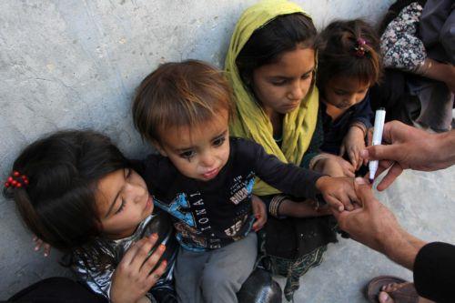 epa11307900 Children receive polio vaccines during a campaign in Kandahar, Afghanistan, 29 April 2024. The Ministry of Public Health in Afghanistan has launched a polio vaccination campaign aiming to vaccinate over 10 million children under five years old. Despite a recent 500 million US dollar contribution from Saudi Arabia towards global eradication...