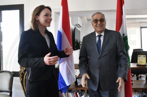 epa11321173 Lebanese Foreign Minister Abdallah Rashid Bou Habib (R) with Dutch Foreign Minister Hanke Bruins Slot (L) during their meeting in Beirut, Lebanon, 06 May 2024. Bruins Slot is on an official visit to Lebanon.  EPA/WAEL HAMZEH