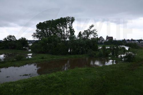 epa11387645 A flooded field next to the railway in Reichertshofen, Germany, 03 June 2024. Heavy rains caused flooding in Germany's southern states of Bavaria and Baden-Wuerttemberg.  EPA/ANNA SZILAGYI