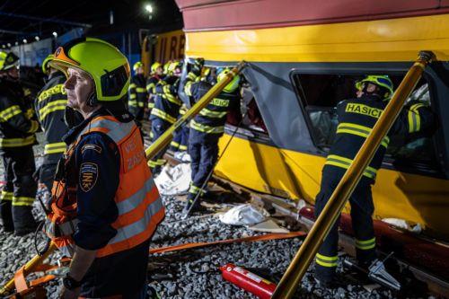 epa11392575 A handout photo made available by the Czech Fire Department showing rescuers working at the scene of a train crash in the city of Pardubice, Czech Republic, 05 June 2024. An express train and a freight train collided head-on in Pardubice late 05 June evening. According to Czech Interior Ministr Vit Rakusan, four people have died at the scene....
