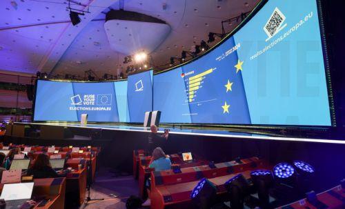 epa11400304 First projection for Germany are displayed at  European Parliament Hemicycle turned into a giant TV Studio from where the broadcast of the results of the European Elections will be aired prior to the European election electoral evening in Brussels, Belgium, 09 June 2024. The European Parliament elections take place across EU member states from...
