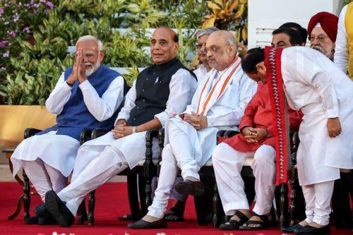 epa11400331 India's Bharatiya Janata Party (BJP) leader Narendra Modi (L), fold hands and thanks cabinet ministers Rajnath Singh (2L), Amit Shah (C), Nitin Gadkari (2R), and Jagat Prakash Nadda (R), after taking oath as India's new prime minister during the swearing-in ceremony at the presidential palace in New Delhi, India, 09 June 2024. Indian Prime...