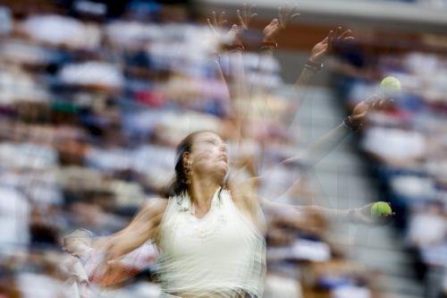 epa11578967 A multiple exposure picture of Emma Navarro of the United States serving to Coco Gauff of the United States during their fourth round match at the US Open Tennis Championships at the USTA Billie Jean King National Tennis Center in Flushing Meadows, New York, USA, 01 September 2024. The US Open tournament runs from 26 August through 08 September....