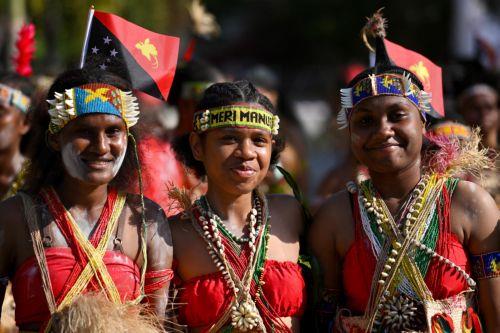 epa11590759 Locals wait for the arrival of Pope Francis at the Street Ministry and Callan Services, in the Caritas Technical Secondary School, in Port Moresby, Papua New Guinea, 07 September 2024. Pope Francis is traveling from 2 to 13 September to conduct apostolic visits to Indonesia, Papua New Guinea, East Timor and Singapore.  EPA/ALESSANDRO DI MEO