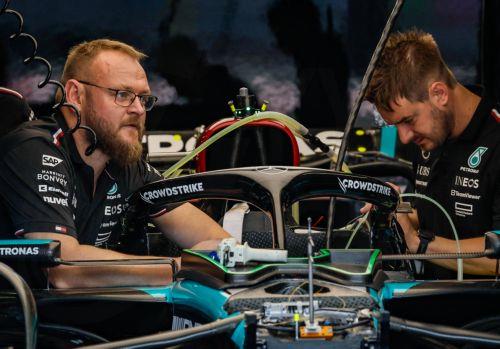 epa11599812 Mechanics work in the garage of British driver George Russell of Mercedes-AMG Petronas ahead of the Formula One Grand Prix of Azerbaijan, at the Baku City Circuit, in Baku, Azerbaijan, 12 September 2024. The Formula One Grand Prix of Azerbaijan will take place on 15 September 2024.  EPA/YURI KOCHETKOV