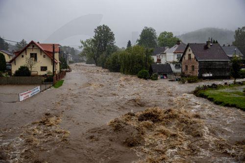epaselect epa11605272 A general view of the overflowing of the Staric River following the heavy rain that hit the village of Lipova-Lazne, Czech Republic, 15 September 2024. Floods caused by heavy rains have been battering central and eastern Europe since 13 September, with at least four dead in Romania, four missing in the Czech Republic, and alarming...