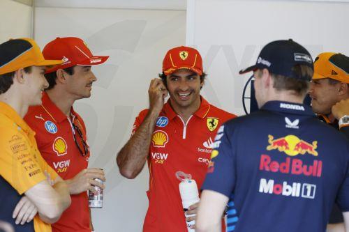 epa11605340 (L-R) Australian driver Oscar Piastri of McLaren F1 Team, Monaco's driver Charles Leclerc of Scuderia Ferrari, Spanish driver Carlos Sainz Jr of Scuderia Ferrari, Dutch Formula One driver Max Verstappen of Red Bull Racing, and British driver Lando Norris of McLaren F1 Team chat before the 2024 Formula One Grand Prix of Azerbaijan, at the Baku...
