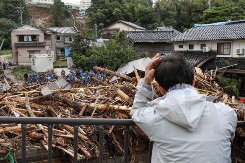 epa11619962 Japan Air Self-Defense Force members search for missing persons in Wajima, Ishikawa Prefecture, Japan, 22 September 2024 (issued 23 September 2024). The Japan Meteorological Agency lifted a heavy rain emergency warning for Suzu, Wajima and Noto towns, keeping the ones for landslides and floods after torrential rain hit the area since 21...