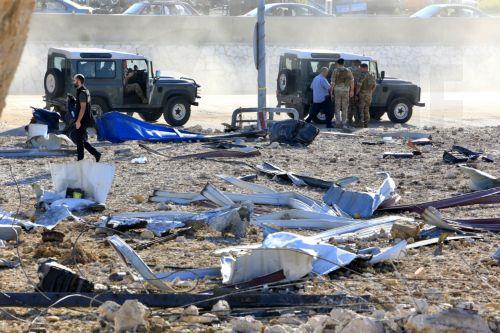 epa11623386 Lebanese soldiers inspect the area near by a damaged building after Israeli raids in Jiyeh, South Lebanon on 25 September2024. According to Lebanon's Ministry of Health, at least 558 people have been killed, and more than 1,835 have been injured following continued Israeli airstrikes on southern Lebanese towns and villages. More than 41,300...