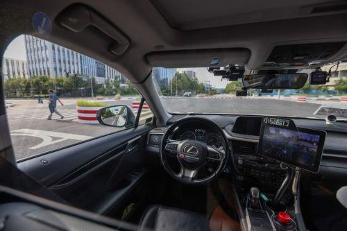 epa11623406 A general view of a self-driving taxi in Daxing district in Beijing, China, 21 August 2024 (issued 25 September 2024). China's capital Beijing initiated the autonomous driving demonstration area in September 2020, and approved the commercial operation of fully autonomous driving services in Beijing E-Town in March 2023. By the end of 2023, over...