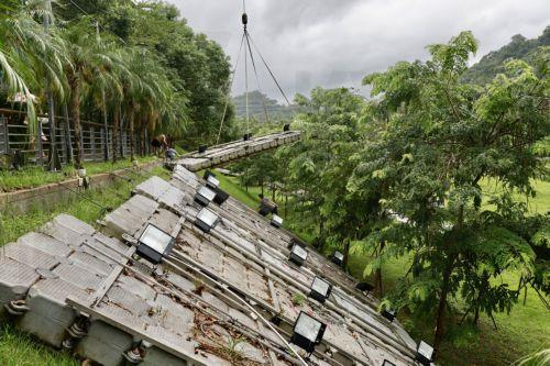 epa11633241 Taiwanese workers secure platforms in anticipation for Typhoon Krathon at the riverside in New Taipei City, Taiwan, 30 September 2024. The Central Weather Administration issued a land warning for Typhoon Krathon as it approached Taiwan. Located about 220 kilometers south-southeast of Cape Eluanbi, the storm was moving west-northwest at 9...