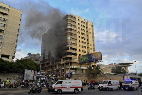 epa11635910 Smoke rises from a building following an Israeli military strike, in the southern suburbs of Beirut, Lebanon, 01 October 2024. According to the Lebanese National News Agency (NNA), Israel targeted two areas in the southern suburbs of Beirut. The Israeli army (Tsahal) said it conducted 'a precise strike' on Beirut on 01 October.  EPA/WAEL HAMZEH