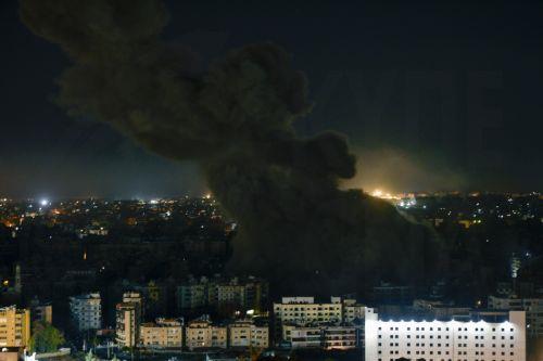epa11649857 Smoke rises over Rafik Hariri International Airport as a result of an Israeli airstrike at Dahieh in the southern suburb of Beirut, Lebanon, 08 October 2024. According to the Lebanese Minister of Health, more than 2,100 people have been killed and more than 9,800 others have been injured in Lebanon since the beginning of the Israeli-Hezbollah...