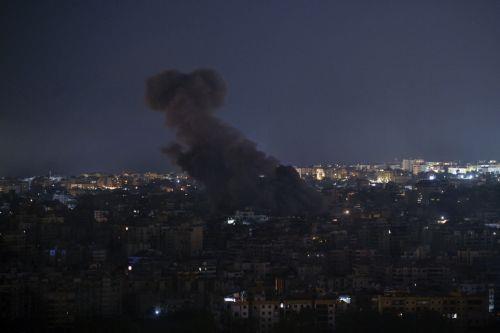 epa11649858 Smoke rises over Rafik Hariri International Airport as a result of an Israeli airstrike at Dahieh in the southern suburb of Beirut, Lebanon, 08 October 2024. According to the Lebanese Minister of Health, more than 2,100 people have been killed and more than 9,800 others have been injured in Lebanon since the beginning of the Israeli-Hezbollah...