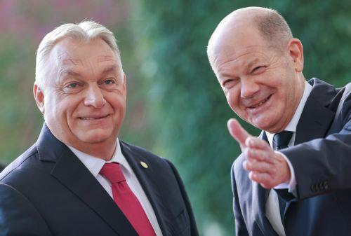 epa11657969 German Chancellor Olaf Scholz (R) welcomes Hungarian Prime Minister Viktor Orban (L) ahead of the 10th 2024 Berlin Process Summit at the Chancellery in Berlin, Germany, 14 October 2024. Chancellor Scholz will hold two working meetings and a working lunch with the participants on the topics of 'Regional Cooperation and Common Regional Market',...
