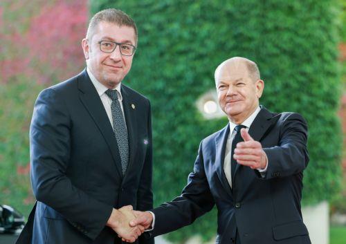 epa11658004 German Chancellor Olaf Scholz (R) welcomes North Macedonia's Prime Minister Hristijan Mickoski (L) ahead of the 10th 2024 Berlin Process Summit at the Chancellery in Berlin, Germany, 14 October 2024. Chancellor Scholz will hold two working meetings and a working lunch with the participants on the topics of 'Regional Cooperation and Common...