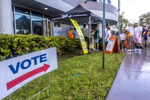 epa11699997 People wait in line to vote on Florida's last early voting day for the 2024 presidential election in Florida, at the Miami-Dade County Elections Department in Miami, Florida, USA, 03 November 2024. Voters in Florida can cast their ballots in person for the presidential election, starting on 21 October, avoiding long lines on Election Day on 05...