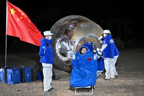 epa11700208 Chinese astronaut Ye Guangfu waves after being carried out of the return capsule of the Shenzhou-18 manned spaceship at the Dongfeng landing site in north China's Inner Mongolia Autonomous Region, 04 November 2024. All three astronauts of the Shenzhou-18 manned mission - Ye Guangfu, Li Cong and Li Guangsu - emerged from the return capsule in...