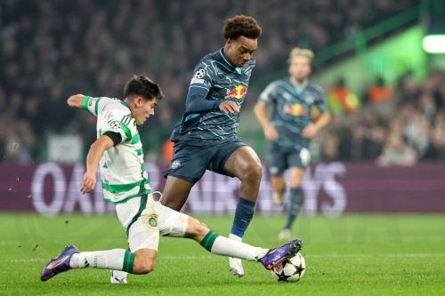 epaselect epa11703976 Alex Valle of Celtic (L) and Assan Ouedraogo of Leipzig (R) in action during the UEFA Champions League soccer match between Celtic FC and RasenBallsport Leipzig, in Glasgow, Britain, 05 November 2024.  EPA/ROBERT PERRY
