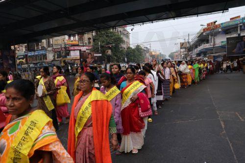 epa11739739 Women from different womenâ€™s organizations take part in a 'Stop violence against women' protest march on the International Day for the Elimination of Violence Against Women in Kolkata, Eastern India, 25 November 2024. They demand stop violence against women at their workplace. The International Day for the Elimination of Violence Against Women...