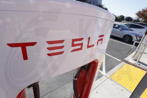 epa11755691 A Tesla SuperCharger in Livermore, California, USA, 03 December 2024. Tesla Superchargers were only open to Tesla drivers until this year, when electric vehicle (EV) owners of Ford, Rivian and General Motors were given access by using an adapter to unlock access to the Tesla EV chargers. Other EVâ€™s by other companies will come later.  EPA/JOHN...