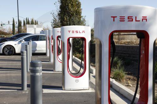 epa11755694 Tesla SuperChargers in Livermore, California, USA, 03 December 2024. Tesla Superchargers were only open to Tesla drivers until this year, when electric vehicle (EV) owners of Ford, Rivian and General Motors were given access by using an adapter to unlock access to the Tesla EV chargers. Other EVâ€™s by other companies will come later.  EPA/JOHN...
