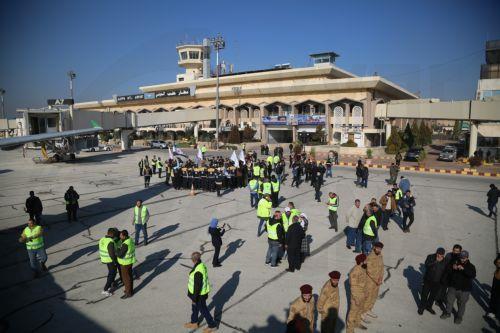 epaselect epa11783666 People stand at Aleppo Airport, which has reopened for the first time since the ouster of president Bashar al-Assad, Aleppo, Syria, 18 December 2024. A Syrian Air Airbus took off from Damascus Airport to Aleppo in the countryâ€™s north for the first time since opposition forces seized the capital, toppling president Bashar al-Assad on...