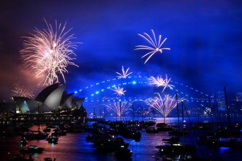 epa11799736 Fireworks illuminate the sky above the Sydney Opera House and the Sydney Harbour Bridge as part of the early New Yearâ€™s Eve celebrations in Sydney, Australia, 31 December 2024.  EPA/BIANCA DE MARCHI NO ARCHIVING AUSTRALIA AND NEW ZEALAND OUT