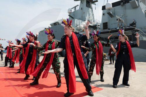 epa11825503 British Royal Navy and Indonesian Navy members perform a traditional dance during a welcoming ceremony for the Batch 2 River-class offshore patrol vessel HMS Spey at Tanjung Prior port in Jakarta, Indonesia, 15 January 2025. HMS Spey will visit Jakarta from 15 to 21 January to engage with the Indonesian navy in military cooperation and conduct...