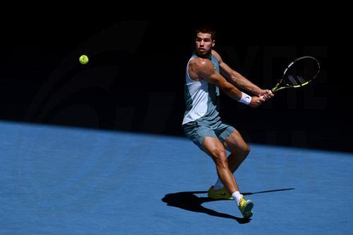 epa11829773 Carlos Alcaraz of Spain in action during a round 3 match against Nuno Borges of Portugal for the Australian Open at Melbourne Park in Melbourne, Australia, 17 January 2025.  EPA/JOEL CARRETT AUSTRALIA AND NEW ZEALAND OUT