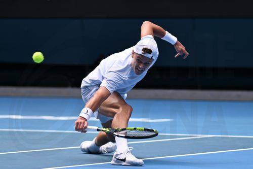 epaselect epa11837699 Holger Rune of Denmark in action against Jannik Sinner of Italy during their fourth round match during the Australian Open tennis tournament at Melbourne Park in Melbourne, Australia, 20 January 2025.  EPA/JAMES ROSS  AUSTRALIA AND NEW ZEALAND OUT