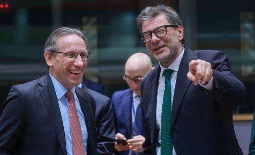 epa11838546 German Federal Minister of Finance Jorg Kukies (L) and Italian Minister of Economy, Giancarlo Giorgetti (R), speak before the start of a Eurogroup finance ministers meeting in Brussels, Belgium, 20 January 2025.Â   EPA/OLIVIER HOSLET