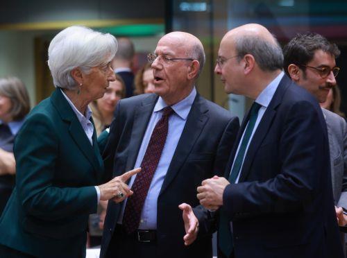 epa11838578 European Central Bank (ECB) President Christine Lagarde (L) speaks with Minister of Finance of Cyprus Makis Keravnos (C) and Greek Finance Minister Kostis Hatzidakis (R) before the start of a Eurogroup finance ministers meeting in Brussels, Belgium, 20 January 2025.Â   EPA/OLIVIER HOSLET
