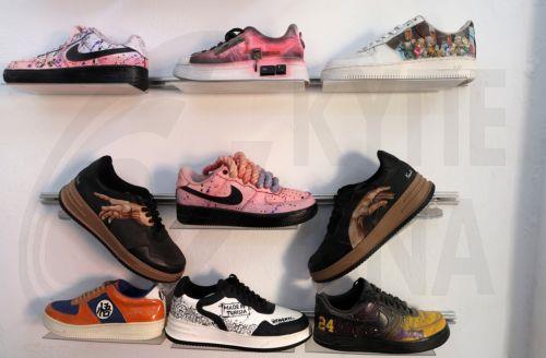 epa11847350 Artistically restored old shoes are displayed at the workshop 'Kenenti' in Tunis, Tunisia, 23 January 2025. The Tunisian startup 'Kenenti', created by Sherif Zerevi, brings new life into worn items, by transforming old shoes and leather bags through artistic restoration, preventing footwear and accessories from ending up in landfills and not...